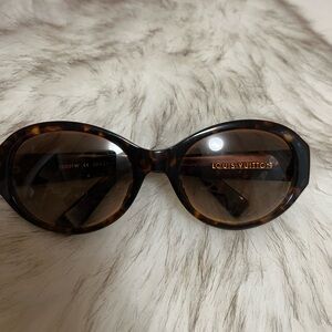 Louis Vuitton sunglasses.